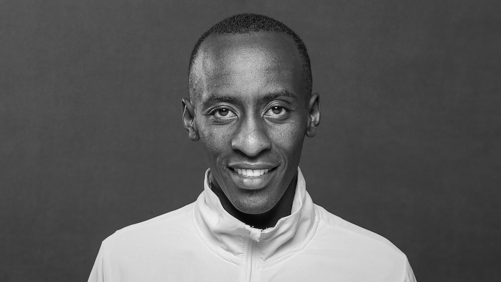 Black-and-white portrait of Kelvin Kiptum.